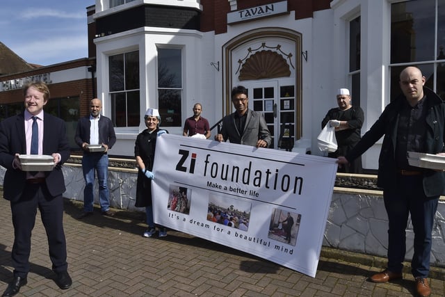 MP for Peterborough Paul Bristow  with  Ishfaq Hussain and Zillur Hussain and staff from the Tavan Restaurant who are starting food deliveries to the needy. They are from the  Zi Foundation, founded by Ivalina Ibanyalieva EMN-200323-154843009