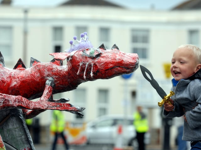 Adams
Casey White battles the red dragon on the Home Start group's float at Bognor Regis Carnival in 2010. Picture: Louise Adams C100957
