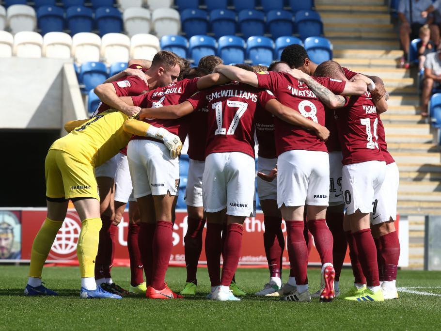 Cobblers huddle.