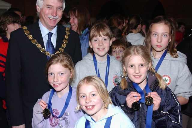 Medals are handed out by the mayor in 2008