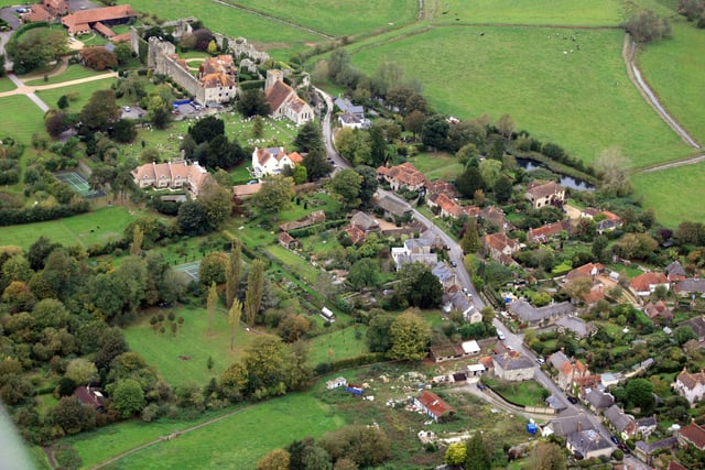 Amberley, with the castle top left. Photo by Derek Martin D11415338a