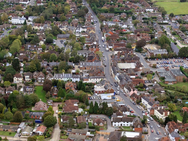 Henfield. High Street runs down through the centre. Photo by Derek Martin D11415450a