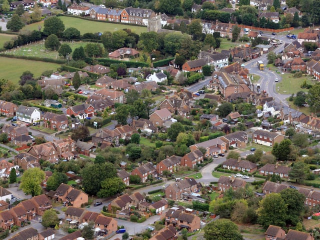 Cowfold looking north west. St Peter's Church is at the top. Photo by Derek Martin D11415476a