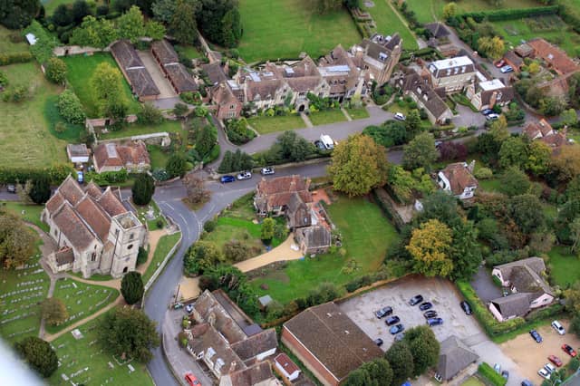Storrington, St Mary's Church is on the left. Photo by Derek Martin D11415399a