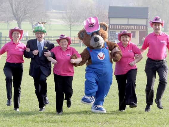 Wicksteed Park has been the home of local charity Crazy Hats for a long time - here is Wicky Bear with Crazy Hats founder Glennis Hooper (left of Wicky Bear) in 2012. (Photo Kit Mallin)