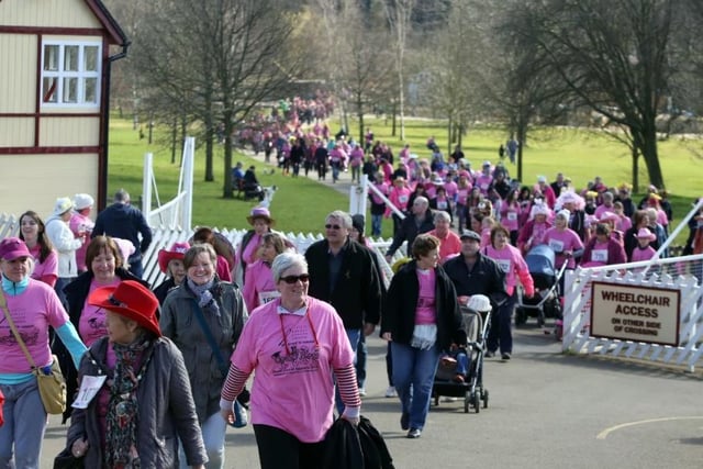 Crazy Hat walkers crossing Wicksteed Park's railway at the 2015 walk. (Photo Alison Bagley)