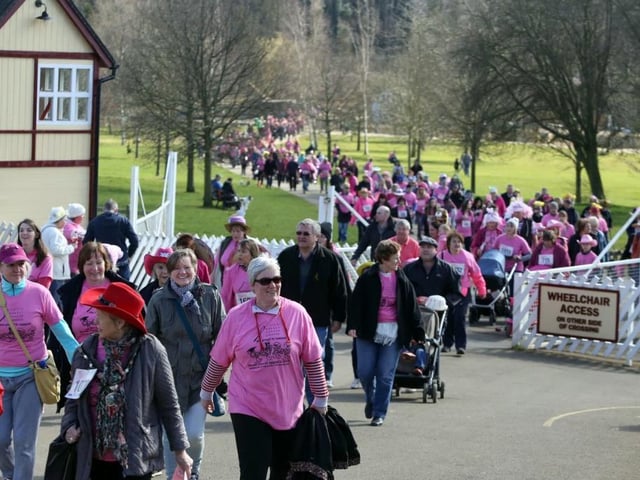 Crazy Hat walkers crossing Wicksteed Park's railway at the 2015 walk. (Photo Alison Bagley)