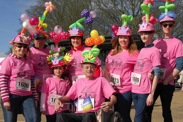 There is always plenty of colourful costumes. We love these balloon hats! This group took part in the 2016 walk. (Photo Crazy Hats).