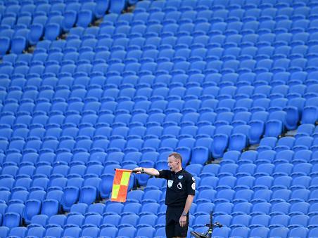 This assistant referee probably quite enjoyed receiving no noise from the crowd