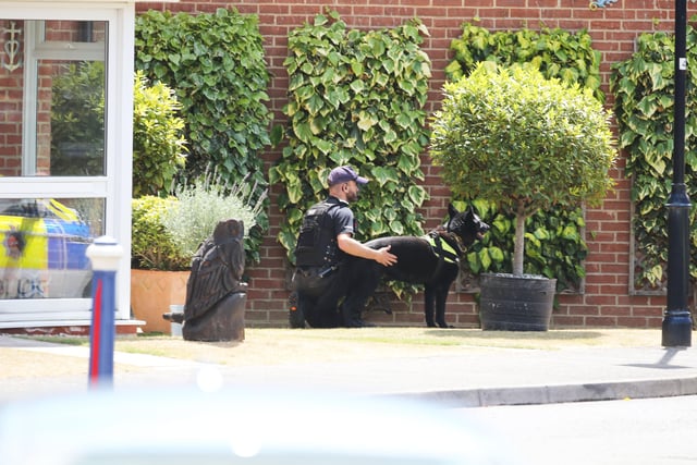 A police officer at the scene in Eastbourne