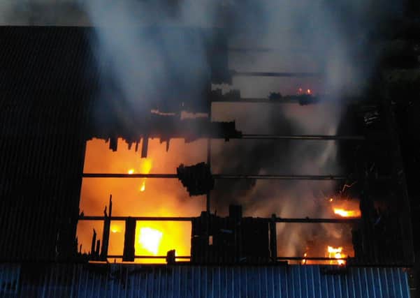 Firefighters used four main jets and a quantity of foam to protect other buildings