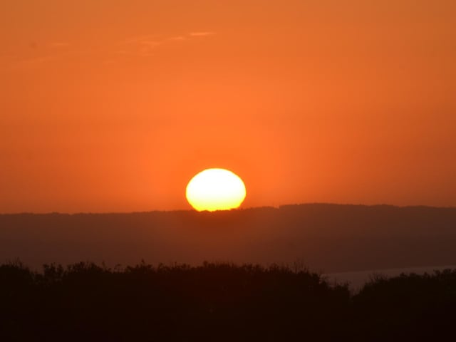 Dawn breaks at the sunshine town, by Jon Taylor