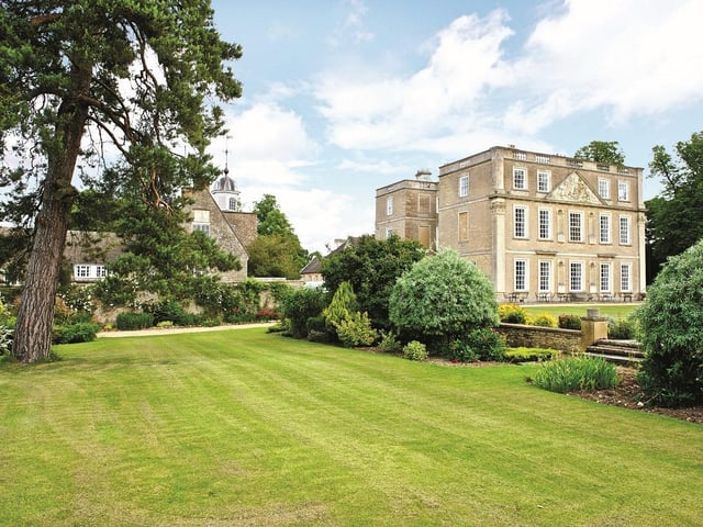 The house is set in 37 acres of parkland with two ornamental lakes and a stream