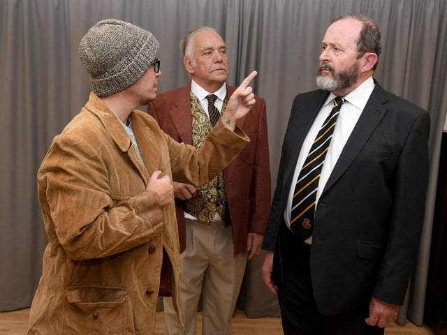 From left: Fiery socialist Eric (Nate McAlpine) clashes with Parliamentarian Walter Pearce (Tony Hine).