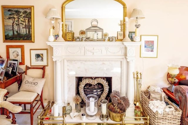 The fireplace with ornate surround