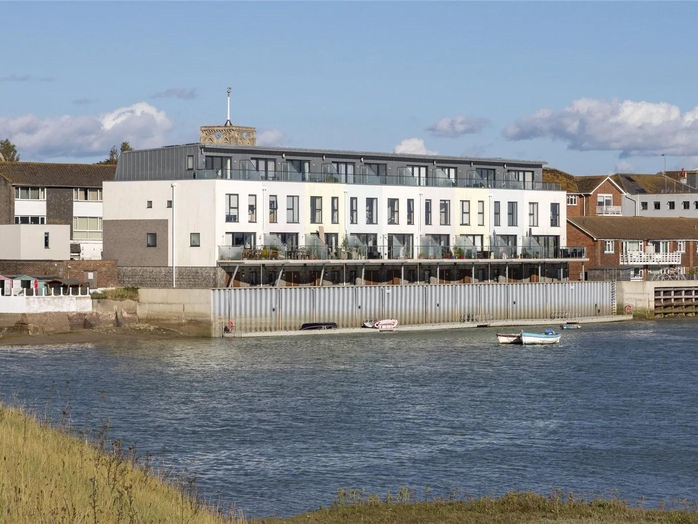 Oyster Quay is an exclusive riverside development of just nine town houses.