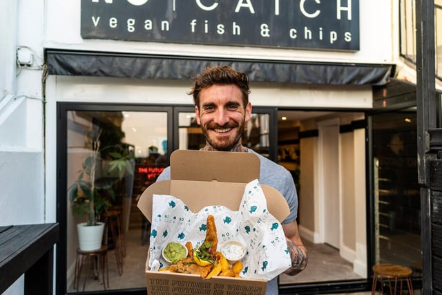 Kevyn Bourke (co-founder and manager)  outside No Catch vegan fish and chip shop in Kings Road, Brighton