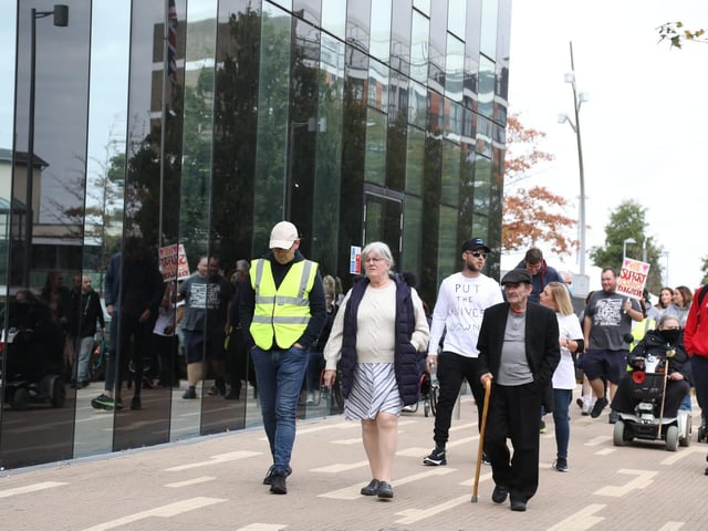 The group, which included local councillors, makes its way to the Corby Cube.