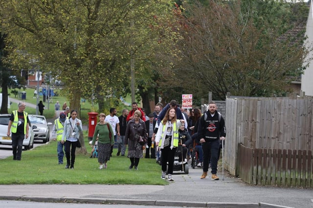 The group walked through the Hazel Leys estate close to where a teenager was stabbed to death five months ago.