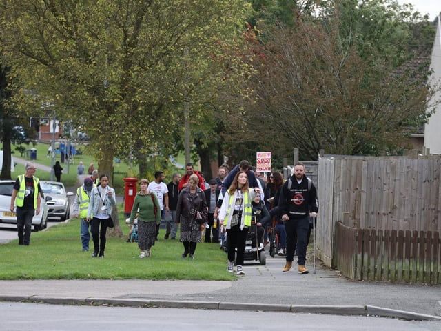 The group walked through the Hazel Leys estate close to where a teenager was stabbed to death five months ago.