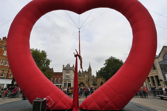 The Dream Engine Love Art heart with performer Nicky Pearson on Cathedral Square EMN-211017-192149009