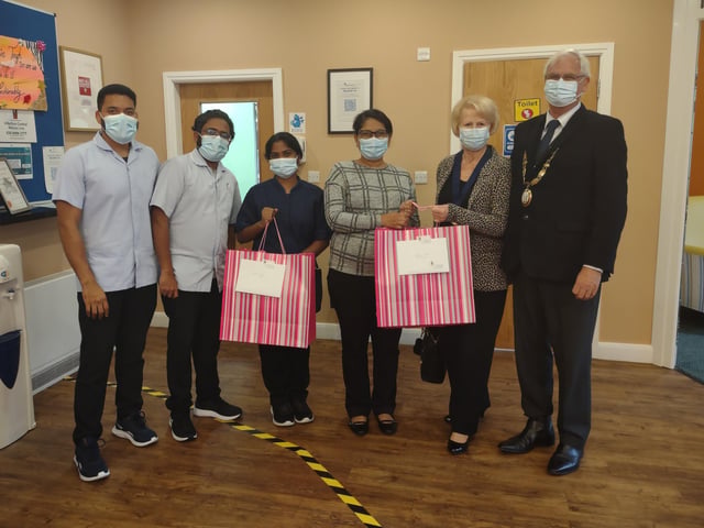 Haywards Heath town mayor Howard Mundin and  Margaret Baker delivered treat bags to care homes for Silver Sunday. Picture: Haywards Heath Town Council.