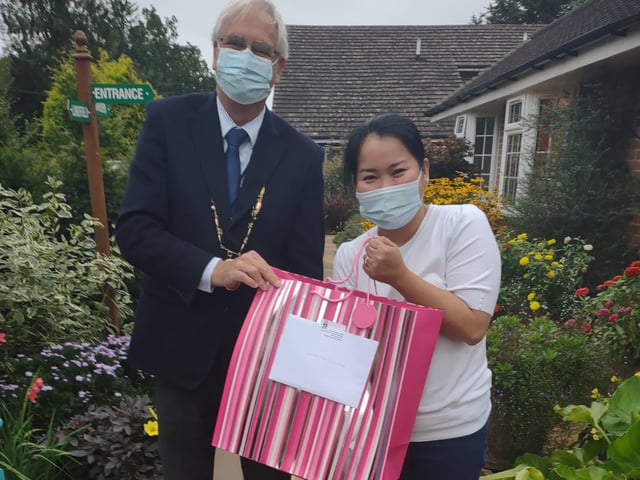 Haywards Heath town mayor Howard Mundin and his consort Margaret Baker delivered treat bags to every care home in town for Silver Sunday. Picture: Haywards Heath Town Council.