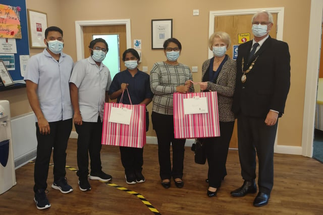 Haywards Heath town mayor Howard Mundin and his consort Margaret Baker delivered treat bags to every care home in town for Silver Sunday. Picture: Haywards Heath Town Council.