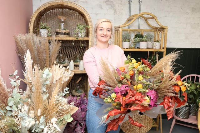 Florist Suzie Whall of Eden Wild, a flower and plant shop based in the complex