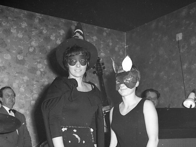 Witch Pam Storey and cat Paula Todd at the Boston Cabaret Club Halloween party in 1966.