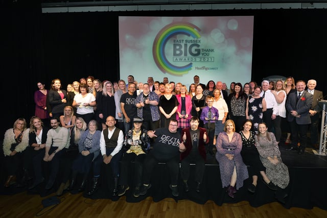 East Sussex Big Thank you Awards 2021. All the Winners celebrate on stage (Pic by Jon Rigby) SUS-211022-103203008