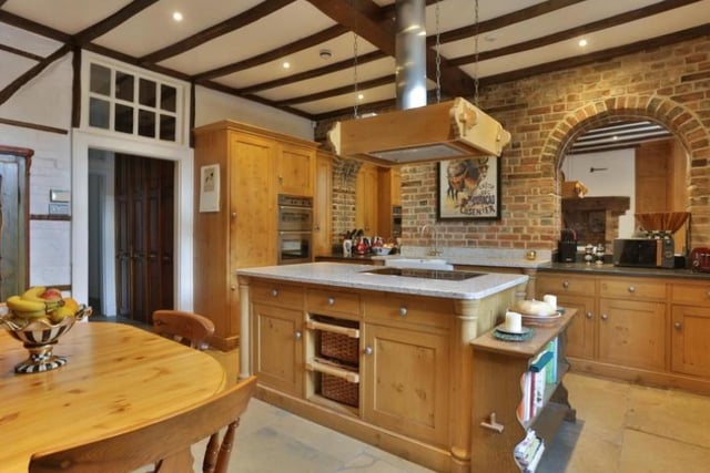 The open plan kitchen is one of the more modern looking elements of the home.