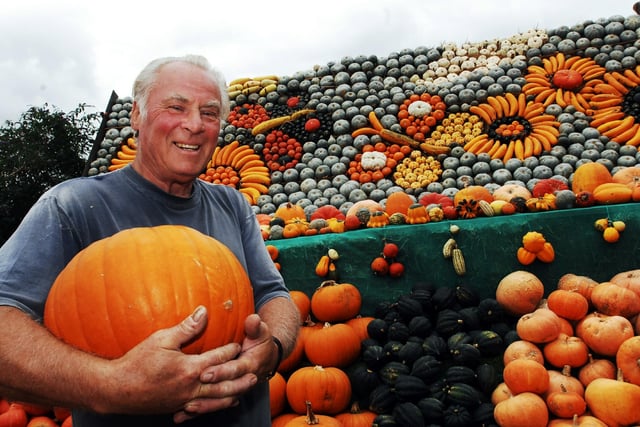 Tony Smith chose butterflies and sunflowers for the pumpkin and gourd display he made at Slindon in 2009 in memory of Ralph Upton, who died in June that year. Picture: Bill Shimmin