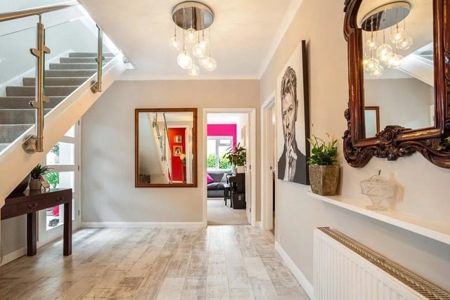 The property has a a wide and welcoming entrance hall. Picture: Hamptons - Haywards Heath Sales.