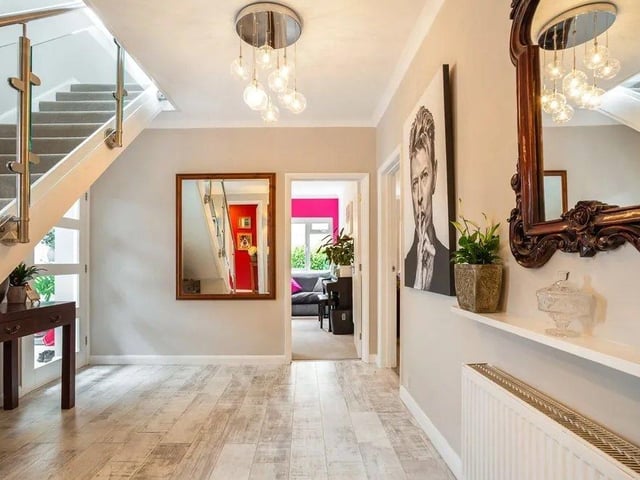 The property has a a wide and welcoming entrance hall. Picture: Hamptons - Haywards Heath Sales.