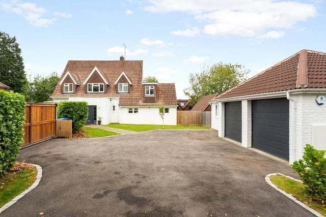 The front of the property has a gated driveway that offers private parking for several cars. Picture: Hamptons - Haywards Heath Sales.