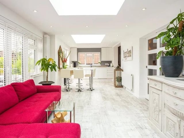 The ground floor is mostly open plan with the kitchen and sitting room flowing through to the dining room. Picture: Hamptons - Haywards Heath Sales.