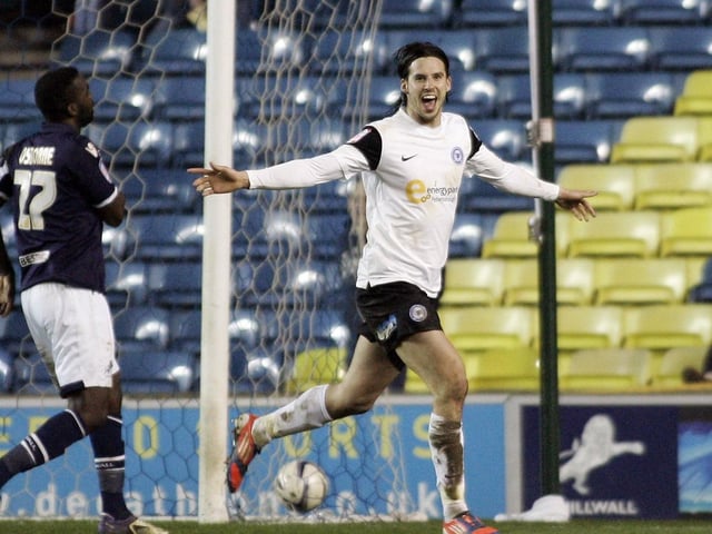George Boyd celebrates a goal for Posh during a memorable 5-1 win at Millwall in a 2013 Championship fixture. Boyd left on loan to Hull City after this game and helped Steve Bruce's side to promotion to the Premier League that season.