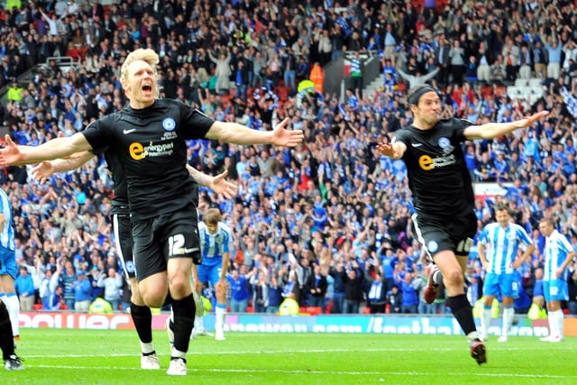 George Boyd (right) celebrates Craig Mackail-Smith's goal for Posh against Huddersfield in the 2011 League One play-off final at Old Trafford.