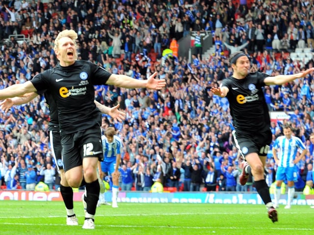 George Boyd (right) celebrates Craig Mackail-Smith's goal for Posh against Huddersfield in the 2011 League One play-off final at Old Trafford.