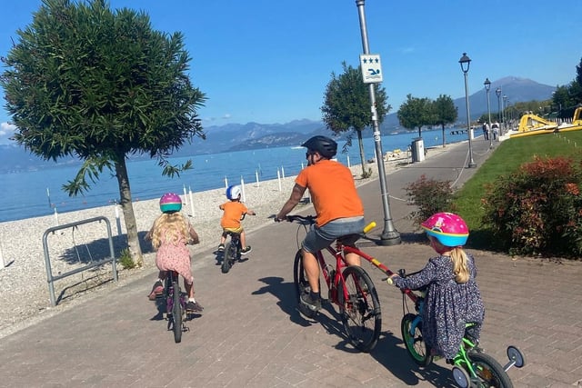 The Lingard family cycling around Lake Garda. EMN-211028-105226001
