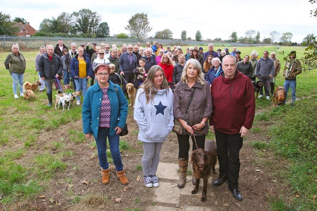 Hundreds of homes could be built on land valued by many members of the community, including dog walkers.