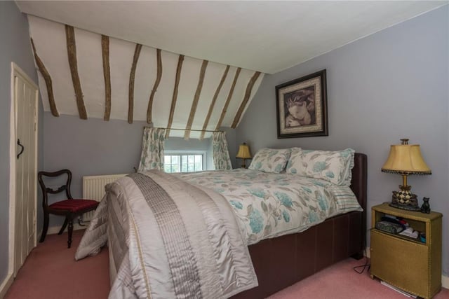 A bedroom inside St Patrick's grade II listed cottage on the market in the village of Aynho near Banbury (Image from Rightmove)