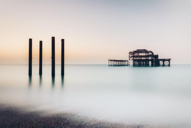 The shoreline by Brighton's West Pier is said to behaunted by a ghostly dog and the apparation of a woman, both of who vanish into thin air. SUS-211031-152314001