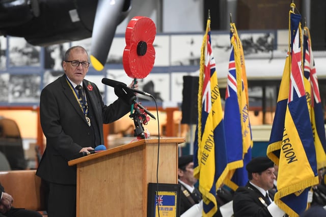 John  Johnson, Lincolnshire County Chairman, welcoming guests to the launch of the Royal British Legion Poppy Appeal in the shadow of the WW2 Lancaster bomber.