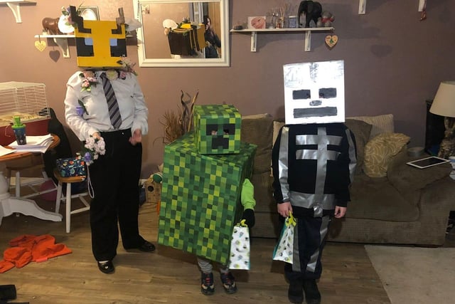 A business bee, creeper and skeleton from the popular game, Minecraft. Photo by RobsnJo Customs.