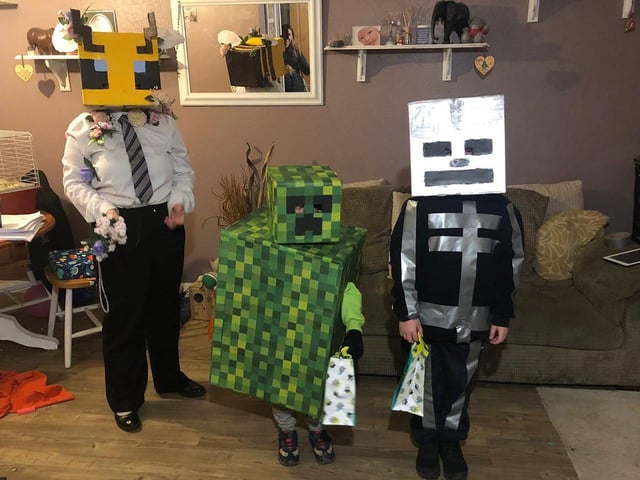 A business bee, creeper and skeleton from the popular game, Minecraft. Photo by RobsnJo Customs.