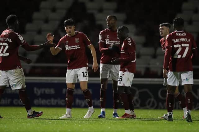 Nicke Kabamba's precise finish gave Cobblers a first-half lead. Pictures: Pete Norton.