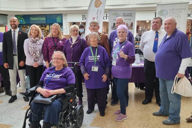 Volunteers gather for Purple Tuesday at the Beaacon Shopping Centre on November 2 SUS-210311-103501001