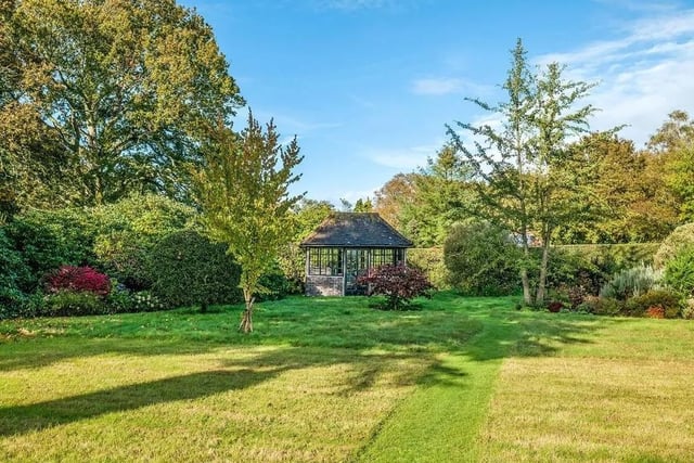 The garden has a summer house so people can enjoy the beautiful surroundings. Picture: Jackson-Stops Lindfield.